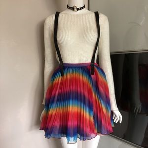 UNIF rainbow pleated skirt with suspenders.